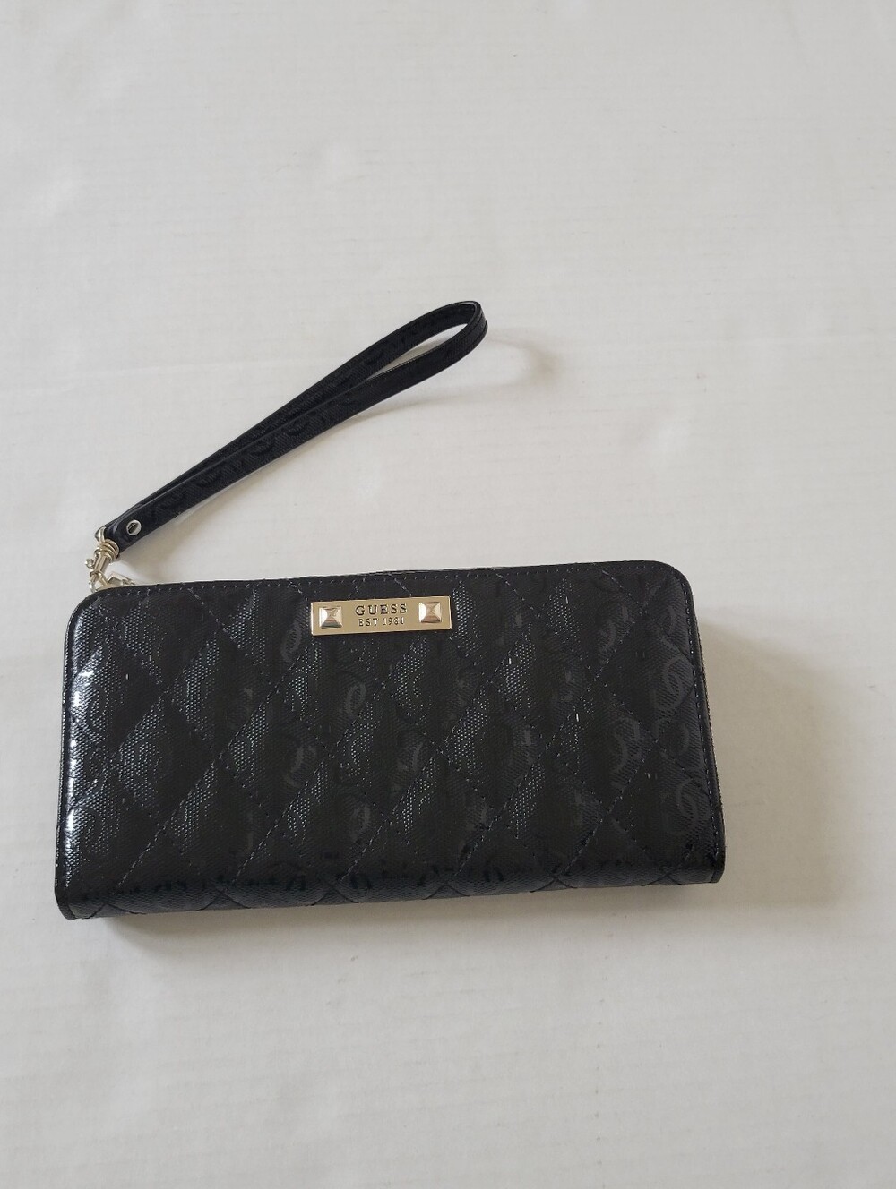 GUESS Black Patent Quilted Logo Wristlet Wallet With Gold Colored Hardware